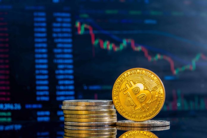 closeup-golden-bitcoins-dark-reflective-surface-histogram-decreasing-crypto-min-min.jpg