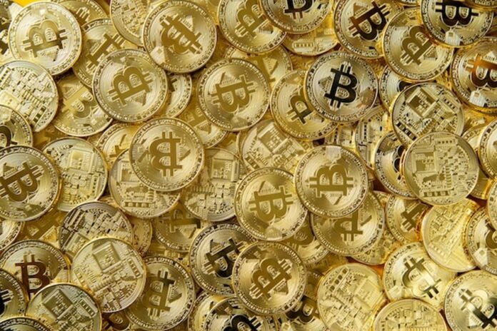 pile-gold-bitcoin-money_53876-146265.jpg